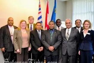 Foreign Minister Peter Shanel and Education Minister Dick Ha'amori with government officials and staff of the Kwantlen Polytechnic University in Canada.