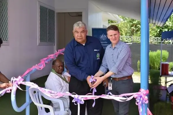 Cutting of ribbon by H.E. Roderick Brazier and PS Supervising MPNSCS Mactus Forau.