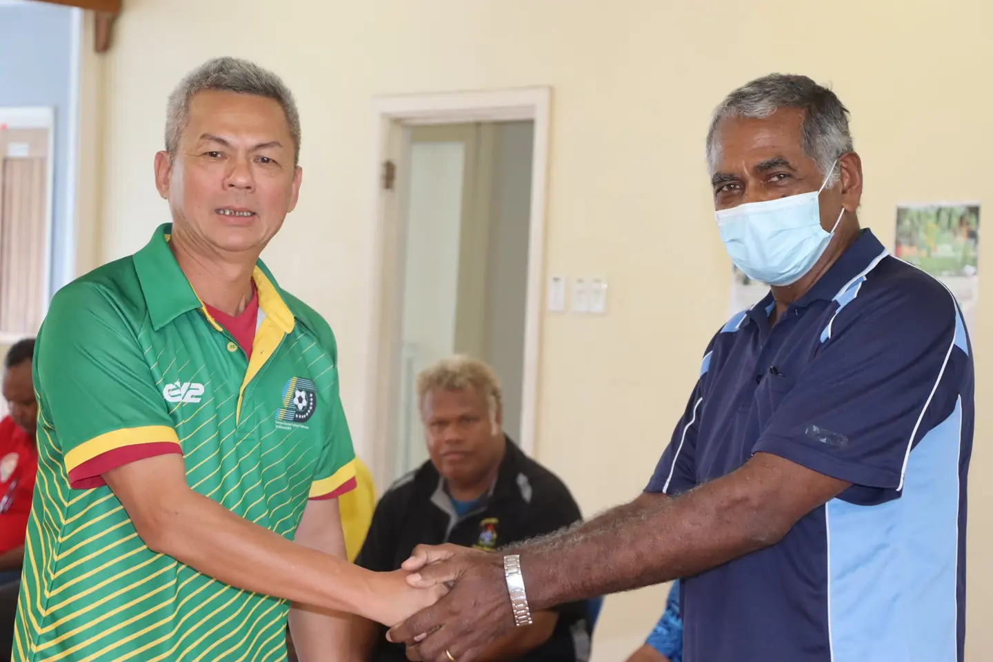 President of the Solomon Islands Football Federation (SIFF) Willie Lai (L) and Chairman of the National Hosting Authority (NHA) Dr. Jimmie Rodgers at the handover ceremony.