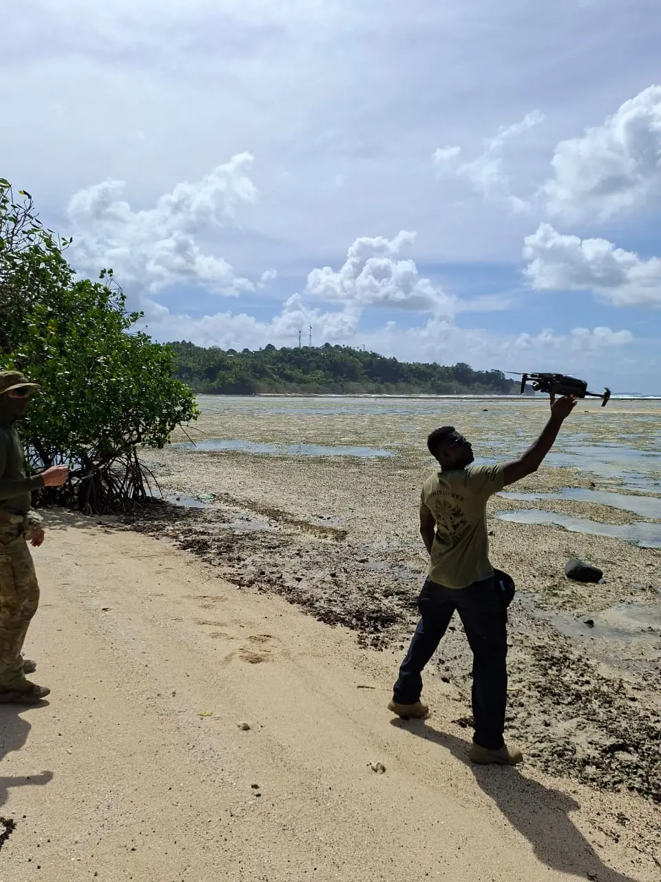 Exercise Coastwatchers members launch a drone to undertake border surveillance activities.