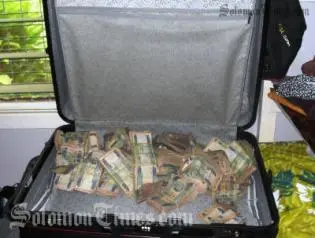The Royal Solomon Islands Police Force's Fraud Squad seized $200,000 cash Philip Bobongi Mbokona home.