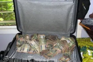 The Royal Solomon Islands Police Force's Fraud Squad seized $200,000 cash Philip Bobongi Mbokona home.