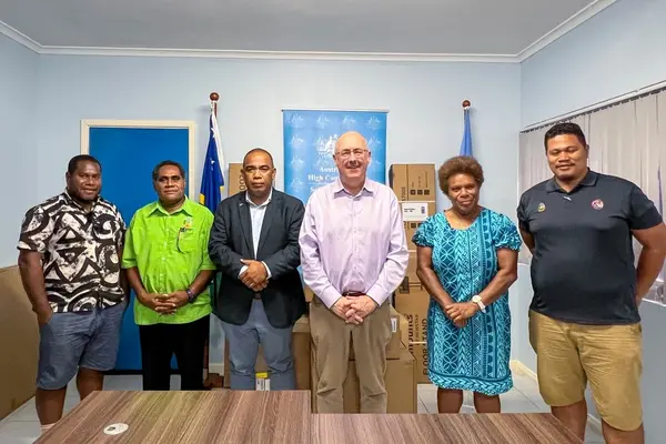 The Permanent Secretary of MECM, the Australian High Commissioner, staff of SIMS and a representative from UNDP during the handover.