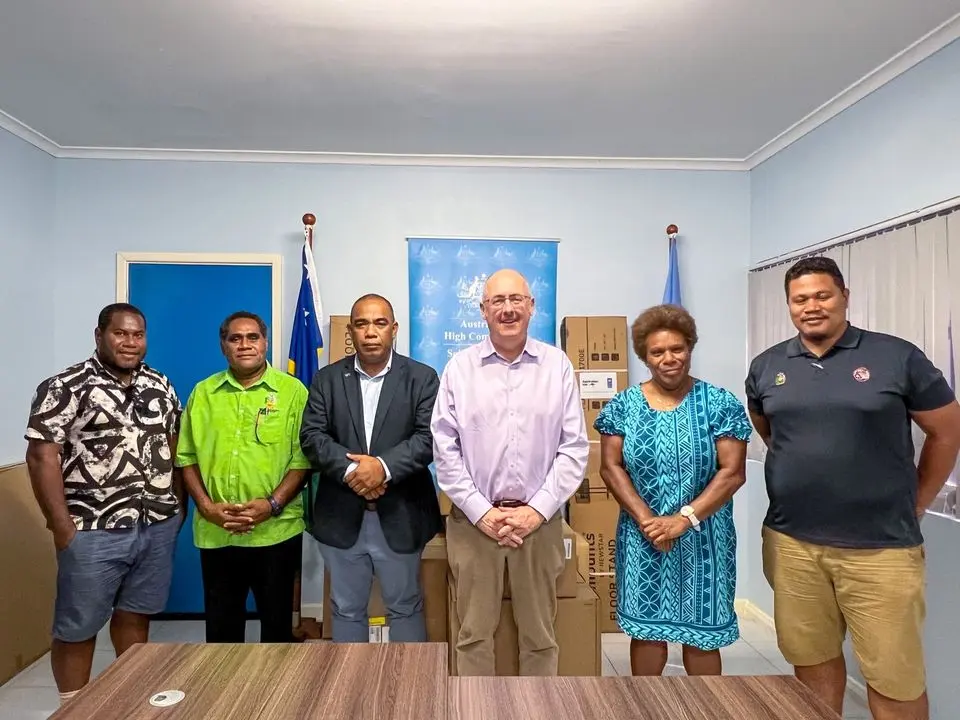 The Permanent Secretary of MECM, the Australian High Commissioner, staff of SIMS and a representative from UNDP during the handover.