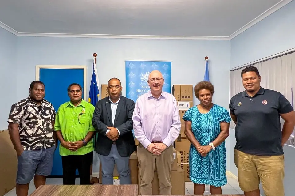 The Permanent Secretary of MECM, the Australian High Commissioner, staff of SIMS and a representative from UNDP during the handover.