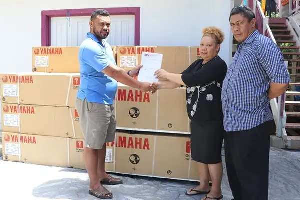 Fleet Solomons Company Managing Director Kensley Manu formally handover the $300,000 worth of Outboard Motor Engines to MP for Temotu Vatud Constituency Freda Rotutafi Rangirei and CDO Justine Tanema.