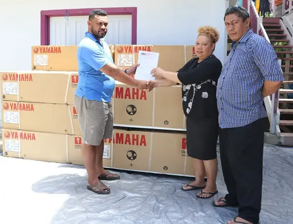Fleet Solomons Company Managing Director Kensley Manu formally handover the $300,000 worth of Outboard Motor Engines to MP for Temotu Vatud Constituency Freda Rotutafi Rangirei and CDO Justine Tanema.