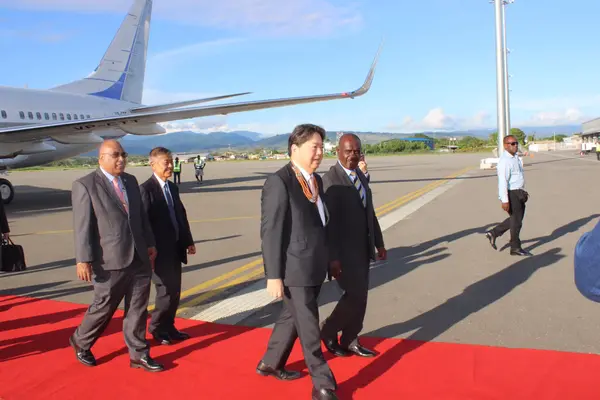 Japanese Foreign Minister Yoshimasa Hayashi given the red carpet treatment on arrival.