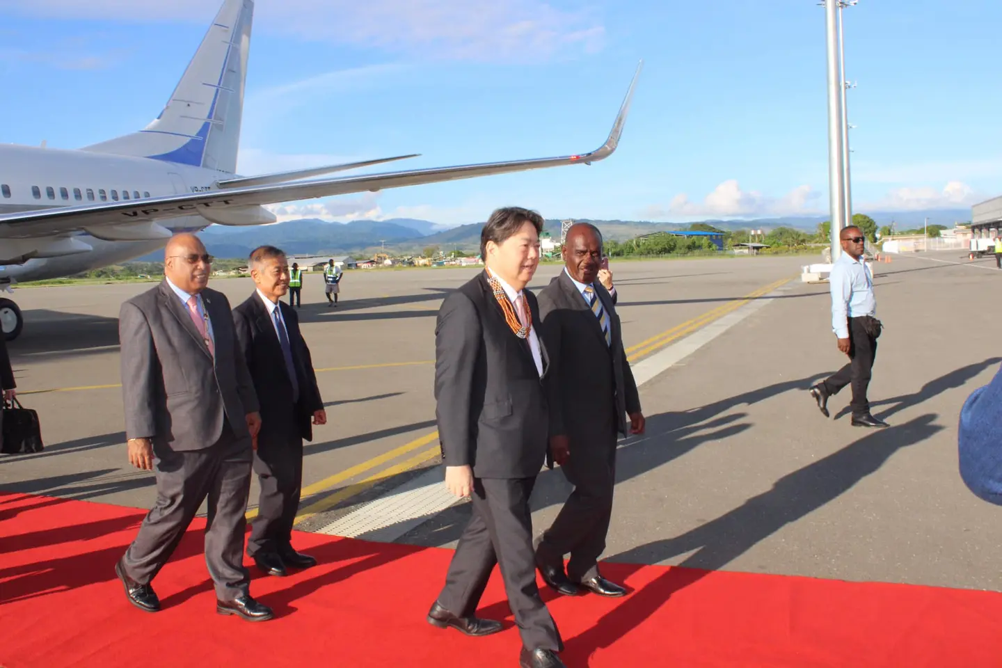Japanese Foreign Minister Yoshimasa Hayashi given the red carpet treatment on arrival.